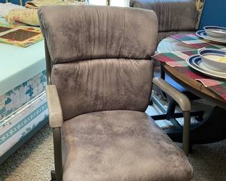 closeup of chairs to dining table