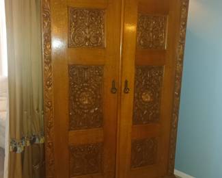 Could Narnia be inside this lovely carved wardrobe?