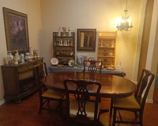 Elegant dining set with painted buffet and glassware