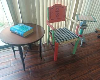 Side table and artistic chair with table.