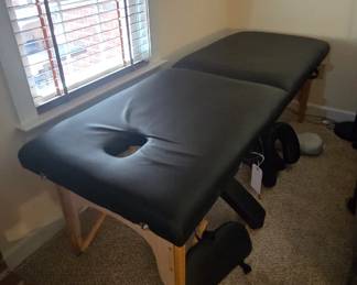 Massage table