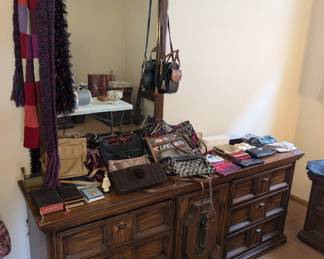 Dresser has a matching dresser and bedframe - Woman's Purses 