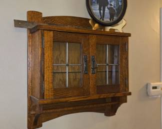 Craftsman style wall cabinet.