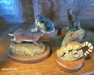 A large selection of animal figurines