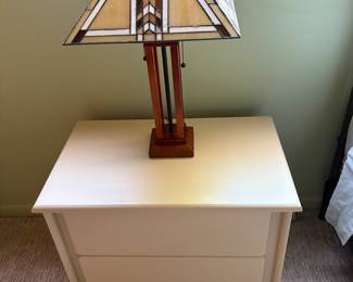 there are 2 lamps and 2 nightstands
