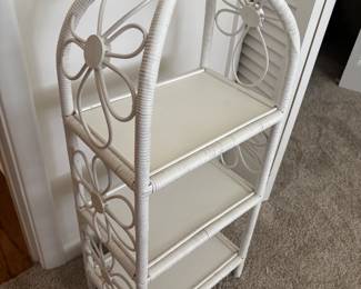 Wicker shelf with floral pattern