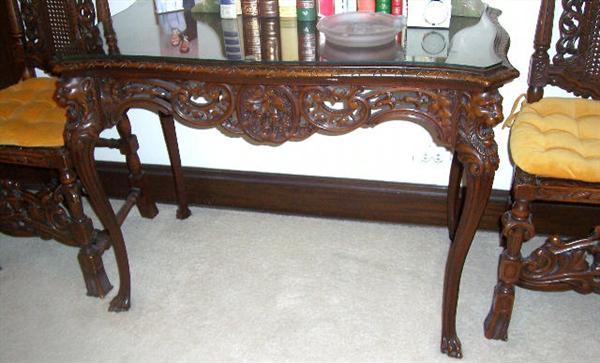 MAGNIFICENT antique carved walnut table with Lion's heads and claw feet

41"L x 23"W x 30"H
