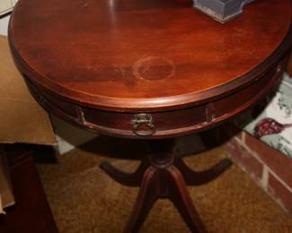 Midcentury round mahogany drum  table w/drawer