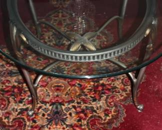 Oval glass top coffee table leaf motif
