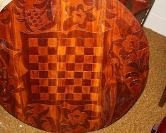 Ornate hand carved  round 'poker' table top w/'checker/chess' on reverse