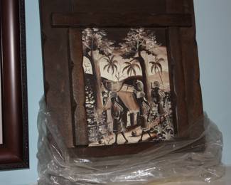 Wood framed canvas etching of villagers