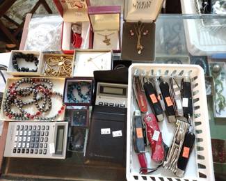 costume jewelry, pocket knives, calculators