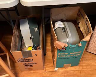 Vintage movie projector and movies