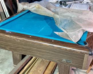Pool table with cues