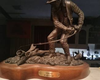 This bronze statue is number 10 of 50. It is an original piece that's made by Jack Bryant who is also the maker of the statue in front of Will Rogers coliseum , Fort Worth's stockyard