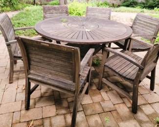 Teak round dining table with 6 chairs
