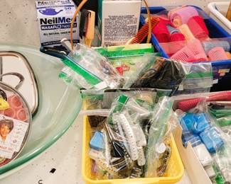 Hair Care supplies: clips and barrettes, curlers.  Make-up brushes and supplies