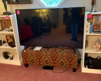 65” LG smart TV. 2020 was the year it was manufactured. The TV is basically new because my client moved to Brunswick 4 or 5 years ago.