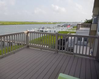 Vinyl railing - tan; Trex decking - tan