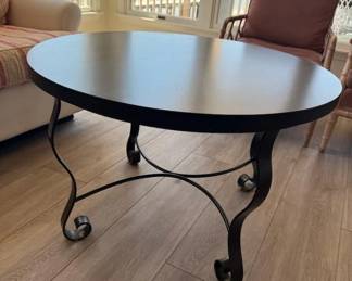 Round wood accent table with wrought iron base