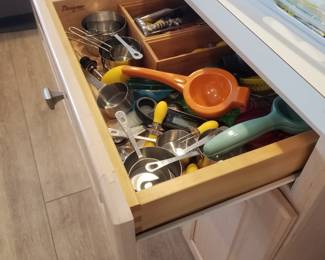Kitchen cabinetry: Designer by Medallion. Flatware & gadgets