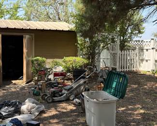 Lawn equipment also hunting items and tent