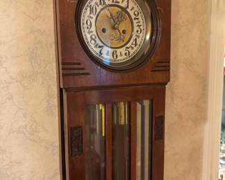 Antique hanging wall clock