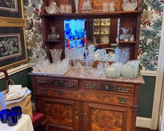 Antique mirrored sideboard with park of the glass collection
