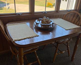 Table with 2 chairs and extra leaf $175