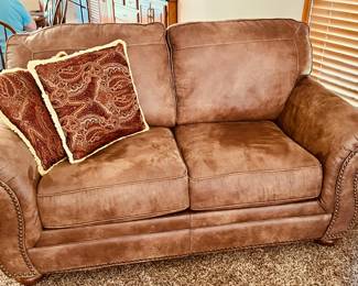 Exceptional upholstered love seat in perfect condition!