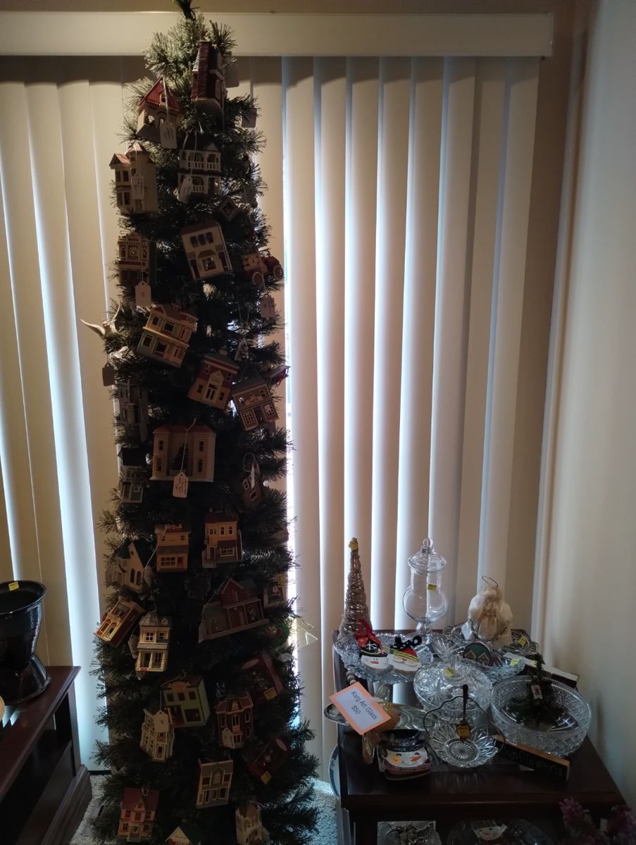Hallmark village ornaments as well as other Hallmark collectible ornaments.