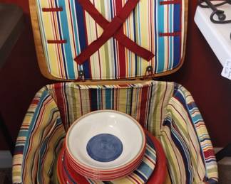 Picnic basket with plates and bowls