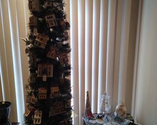 Hallmark village ornaments as well as other Hallmark collectible ornaments.