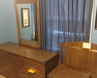 Twin bed, dresser, nightstand, and four drawer dresser.