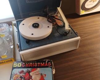 Sears record player, in working condition, and records.