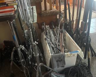 Microphone stands and misc stand parts for percussion or players, lots of stands and cords for sound 