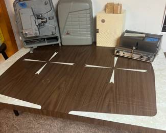1970’s table and two projectors 