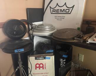 Multi drum heads, parts, light up drum sticks all red, stool , percussion table in box , symbols , portable fan for summer set up 