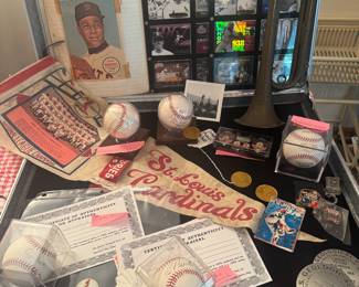 Lou Brock
Stan Musial
Ozzy smith 
Complete 1967 cardinals World Series team ball w pennant 
Land markers 
World Series pins 
