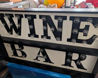 This is a two piece sign that has lights