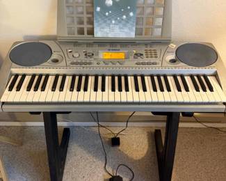 62 YamahaPSR275ElectronicKeyboardwithBassBoostSystem