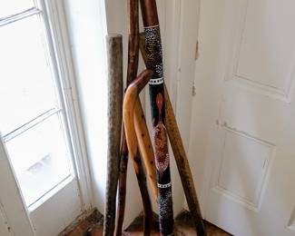 Hand-painted didgeridoo with walking sticks and cactus thunder sticks