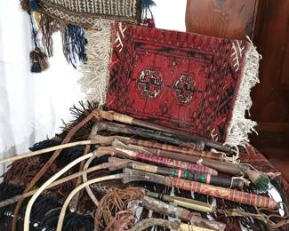 Afghan collectibles - saddlebags, pillow, and some camel whips (many more not shown)