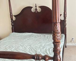 King Size Four Poster Bed And Decorative Pillows