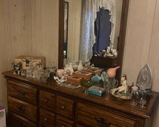 Bedroom set with bed and cheater drawers .