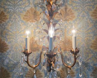 One of a pair gilt Italian metalwork and crystal sconces 