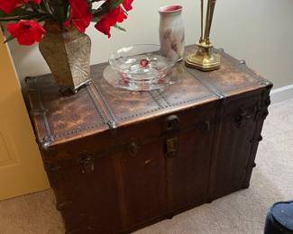 Wonderful leather trunk and brass studs