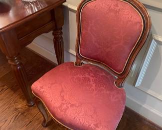 One of a pair French carved walnut side chairs 