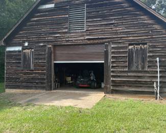 This is barn #2. There is a tractor and mowers that are not part of the sale but we have lots of tools and other equipment including pecan harvesting equipment