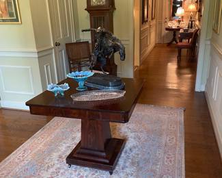 View of entry hall with Empire center table